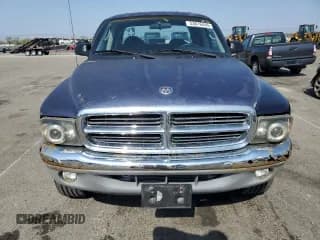 ✅ 2001 Dodge Dakota Sport • VIN: 1B7HG2AN01S325273 • Lot: 53616445. Wystawiony na Copart z przebiegiem 188 635 mil. Bezpłatny archiwum sprzedaży aukcyjnych z USA i szczegółowy raport historii pojazdu na DreamBid. Zdjęcie 5.