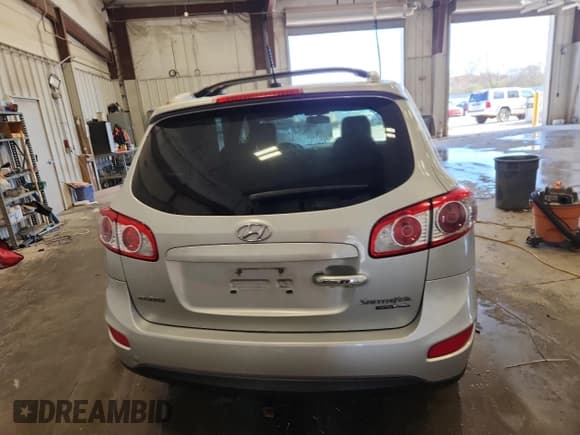 ✅ 2011 Hyundai Santa Fe Limited • VIN: 5XYZKDAG2BG041067 • Lot: 82503735. Listed on Copart with 139,704 mi. Free auction sales archive from the USA and detailed vehicle history report at DreamBid. Image 6.