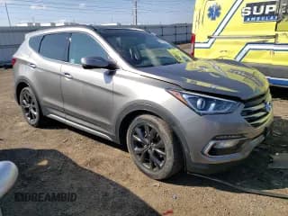 ✅ 2017 Hyundai Santa Fe Ultimate • VIN: 5XYZW4LA1HG386824 • Лот: 46120733. Опубликован ранее на Copart с пробегом Не указан. Бесплатный доступ к архиву аукционных продаж из США и подробный отчёт об истории автомобиля на DreamBid. Изображение 4.