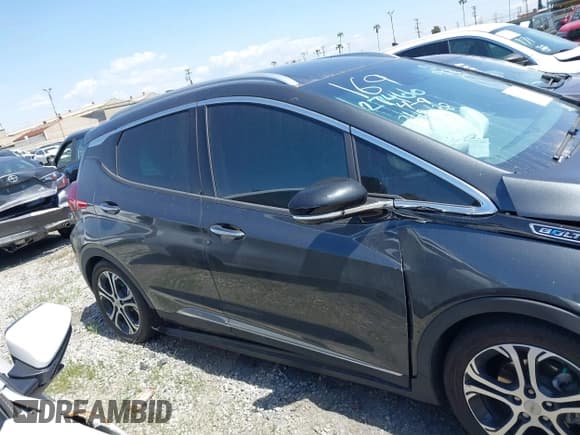 ✅ 2021 Chevrolet Bolt EV Premier • VIN: 1G1FZ6S01M4113902 • Lot: 41642702. Wystawiony na IAAI z przebiegiem 33 026 mil. Bezpłatny archiwum sprzedaży aukcyjnych z USA i szczegółowy raport historii pojazdu na DreamBid. Zdjęcie 14.