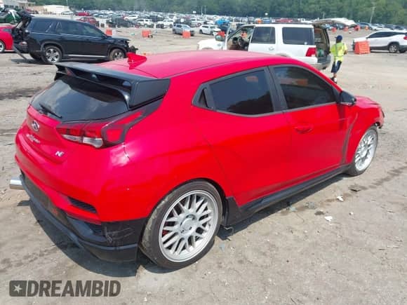 2019 Hyundai Veloster N z VIN KMHT36AH7KU002461, wystawiony jako IAAI lot #42578737 z przebiegiem 135 870 mil mil oraz . Historia ofert i sprzedaży dostępna na DreamBid. Obrazek 4.