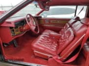 ✅ 1985 Cadillac Eldorado • VIN: 1G6EL5782FE634074 • Lot: 44520964. Listed on Copart with 74,425 mi. Free auction sales archive from the USA and detailed vehicle history report at DreamBid. Image 7.