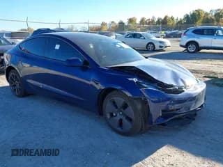 ✅ 2023 Tesla Model 3 • VIN: 5YJ3E1EA0PF477531 • Лот: 43641200. Опубликован ранее на IAAI с пробегом 34 325 миль. Бесплатный доступ к архиву аукционных продаж из США и подробный отчёт об истории автомобиля на DreamBid. Изображение 1.