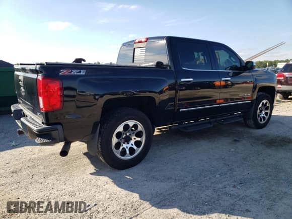 2017 Chevrolet Silverado 1500 LTZ with VIN 3GCUKSEC9HG144633, listed as a Copart auction lot 90666425 with 139,199 mi miles and Salvage title. Bid and sale history available at DreamBid. Image 3.
