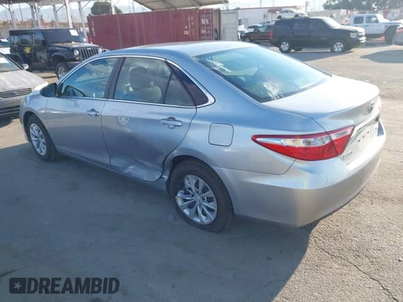 2016 Toyota Camry LE with VIN 4T4BF1FK2GR528875, listed as a IAAI auction lot 43236649 with 26,927 mi miles and . Bid and sale history available at DreamBid. Image 3.
