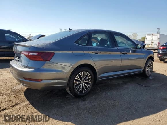 ✅ 2021 Volkswagen Jetta S • VIN: 3VWC57BU4MM071421 • Lot: 85906675. Wystawiony na Copart z przebiegiem 15 066 mil. Bezpłatny archiwum sprzedaży aukcyjnych z USA i szczegółowy raport historii pojazdu na DreamBid. Zdjęcie 3.