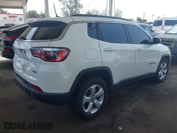 ✅ 2020 Jeep Compass Latitude • VIN: 3C4NJCBB8LT141375 • Lot: 42382374. Listed on IAAI with 63,799 mi. Free auction sales archive from the USA and detailed vehicle history report at DreamBid. Image 4.