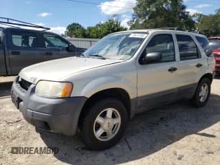 ✅ 2003 Ford Escape XLT Popular • VIN: 1FMYU031X3KD91433 • Lot: 70675795. Listed on Copart with 295,938 mi. Free auction sales archive from the USA and detailed vehicle history report at DreamBid. Image 1.