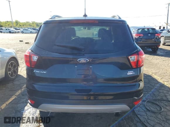 ✅ 2019 Ford Escape SEL • VIN: 1FMCU9HD8KUB25252 • Lot: 70593115. Listed on Copart with 100,204 mi. Free auction sales archive from the USA and detailed vehicle history report at DreamBid. Image 6.