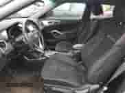 2017 Hyundai Veloster z VIN KMHTC6AD8HU310860, wystawiony jako Copart lot #42170923 z przebiegiem 97 009 mil mil oraz . Historia ofert i sprzedaży dostępna na DreamBid. Obrazek 7.