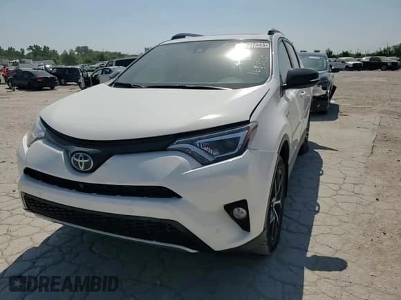 ✅ 2018 Toyota RAV4 Hybrid SE • VIN: JTMJJREV4JD165800 • Lot: 67207445. Listed on Copart with 148,002 mi. Free auction sales archive from the USA and detailed vehicle history report at DreamBid. Image 13.