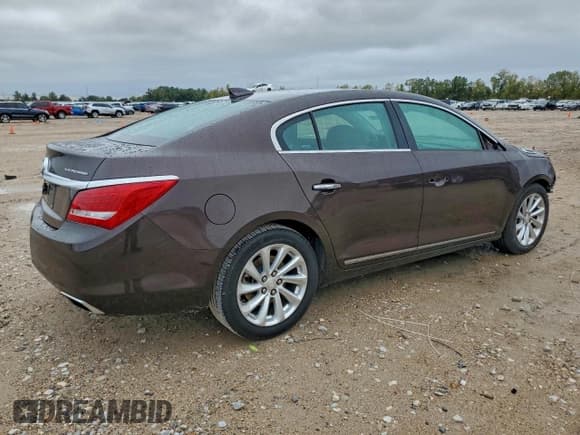✅ 2015 Buick LaCrosse Leather • VIN: 1G4GB5G39FF306069 • Лот: 95307135. Опубликован ранее на Copart с пробегом 159 224 миль. Бесплатный доступ к архиву аукционных продаж из США и подробный отчёт об истории автомобиля на DreamBid. Изображение 3.