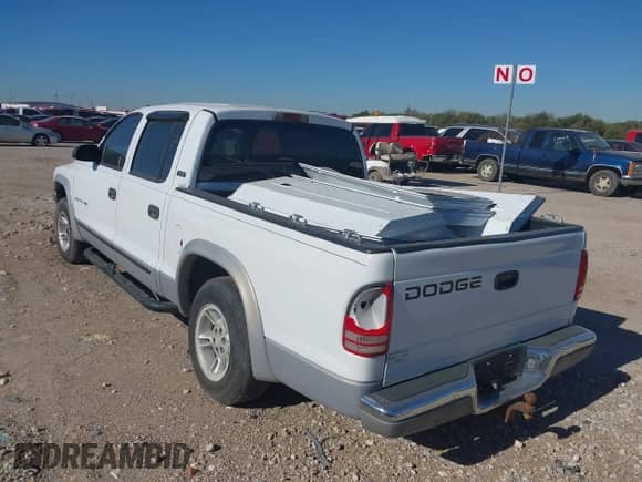 ✅ 2000 Dodge Dakota Sport • VIN: 1B7GL2AN6YS679879 • Лот: 37794003. Размещён на IAAI с пробегом 190 708 миль миль. Получите бесплатный доступ к архиву аукционных продаж из США и посмотрите подробный отчёт об истории автомобиля на DreamBid. Изображение 3.