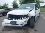 ✅ 2006 GMC Envoy SLE • VIN: 1GKDT13S762251921 • Lot: 42460295. Listed on IAAI with 206,063 mi. Free auction sales archive from the USA and detailed vehicle history report at DreamBid. Image 2.