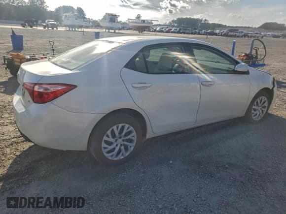 ✅ 2018 Toyota Corolla LE • VIN: 5YFBURHE9JP814916 • Lot: 94506375. Listed on Copart with 191,700 mi. Free auction sales archive from the USA and detailed vehicle history report at DreamBid. Image 3.