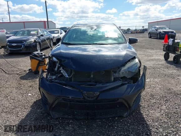 ✅ 2018 Toyota Corolla LE • VIN: 2T1BURHE4JC990014 • Lot: 43615119. Listed on IAAI with 244,368 mi. Free auction sales archive from the USA and detailed vehicle history report at DreamBid. Image 12.