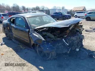 2010 Dodge Charger Police with VIN 2B3AA4CV0AH224092, listed as a IAAI auction lot 41881563 with 219,980 mi miles and . Bid and sale history available at DreamBid. Image 1.