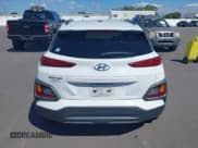 ✅ 2018 Hyundai Kona SEL • VIN: KM8K62AA5JU073459 • Лот: 43352612. Опубликован ранее на IAAI с пробегом 77 655 миль. Бесплатный доступ к архиву аукционных продаж из США и подробный отчёт об истории автомобиля на DreamBid. Изображение 16.