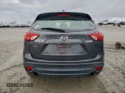 ✅ 2015 Mazda CX-5 Sport • VIN: JM3KE2BE0F0502750 • Lot: 93753425. Listed on Copart with 101,312 mi. Free auction sales archive from the USA and detailed vehicle history report at DreamBid. Image 6.