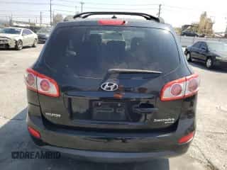 2010 Hyundai Santa Fe GLS z VIN 5NMSGDAB1AH411792, wystawiony jako Copart lot #71492494 z przebiegiem 144 284 mil mil oraz Szkoda całkowita • Salvage title. Historia ofert i sprzedaży dostępna na DreamBid. Obrazek 6.