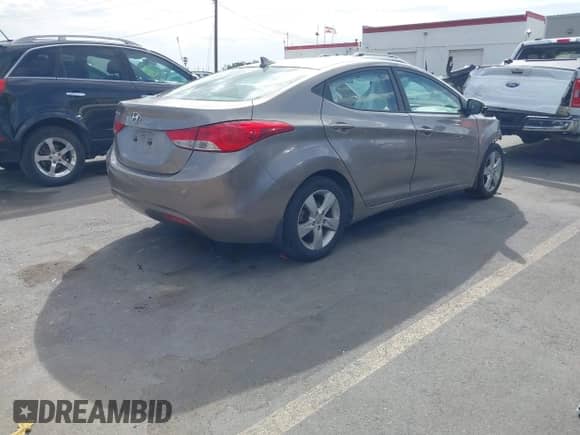 2013 Hyundai Elantra Limited with VIN 5NPDH4AE0DH199720, listed as a IAAI auction lot 43192359 with 118,383 mi miles and . Bid and sale history available at DreamBid. Image 4.
