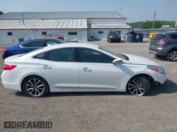✅ 2015 Hyundai Azera • VIN: KMHFG4JG3FA447672 • Лот: 42474930. Опубликован ранее на IAAI с пробегом 125 425 миль. Бесплатный доступ к архиву аукционных продаж из США и подробный отчёт об истории автомобиля на DreamBid. Изображение 13.