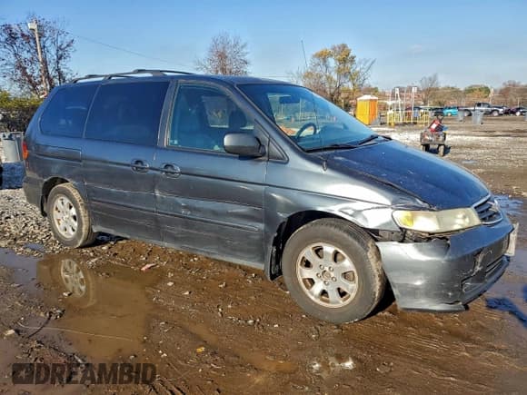✅ 2003 Honda Odyssey EX • VIN: 5FNRL18663B042403 • Лот: 93686715. Опубликован ранее на Copart с пробегом 242 883 миль. Бесплатный доступ к архиву аукционных продаж из США и подробный отчёт об истории автомобиля на DreamBid. Изображение 4.