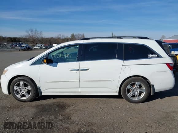 ✅ 2011 Honda Odyssey Touring • VIN: 5FNRL5H93BB053052 • Lot: 43788957. Listed on IAAI with 178,627 mi. Free auction sales archive from the USA and detailed vehicle history report at DreamBid. Image 14.