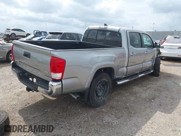 ✅ 2017 Toyota Tacoma SR5 • VIN: 5TFBZ5DN7HX002249 • Lot: 42136759. Listed on IAAI with 144,477 mi. Free auction sales archive from the USA and detailed vehicle history report at DreamBid. Image 4.