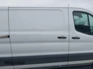 ✅ 2021 Ford Transit Cargo • VIN: 1FTYE1Y85MKA37544 • Lot: 43160253. Listed on IAAI with 376,838 mi. Free auction sales archive from the USA and detailed vehicle history report at DreamBid. Image 13.