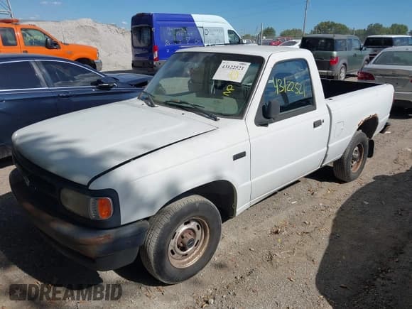 ✅ 1994 Mazda B-Series • VIN: 4F4CR12A0RTM31231 • Lot: 43122521. Listed on IAAI with 97,363 mi. Free auction sales archive from the USA and detailed vehicle history report at DreamBid. Image 12.