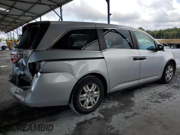 ✅ 2013 Honda Odyssey LX • VIN: 5FNRL5H27DB052198 • Lot: 85646085. Listed on Copart with 130,530 mi. Free auction sales archive from the USA and detailed vehicle history report at DreamBid. Image 3.