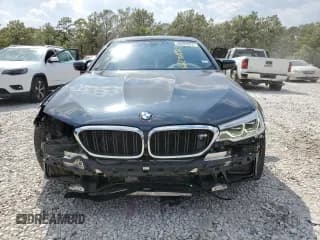 ✅ 2018 BMW M5 • VIN: WBSJF0C58JB282672 • Lot: 66288923. Wystawiony na Copart z przebiegiem 53 658 mil. Bezpłatny archiwum sprzedaży aukcyjnych z USA i szczegółowy raport historii pojazdu na DreamBid. Zdjęcie 5.