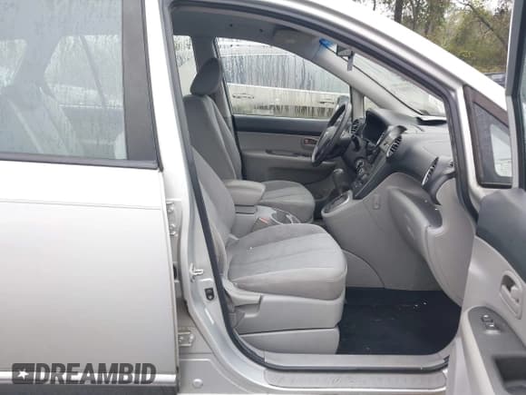 ✅ 2008 Kia Rondo EX • VIN: KNAFG526387136756 • Lot: 43592665. Wystawiony na IAAI z przebiegiem 151 381 mil. Bezpłatny archiwum sprzedaży aukcyjnych z USA i szczegółowy raport historii pojazdu na DreamBid. Zdjęcie 5.