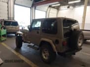 ✅ 2004 Jeep Wrangler Sahara • VIN: 1J4FA59S04P747727 • Lot: 43599384. Listed on IAAI with 190,912 mi. Free auction sales archive from the USA and detailed vehicle history report at DreamBid. Image 3.