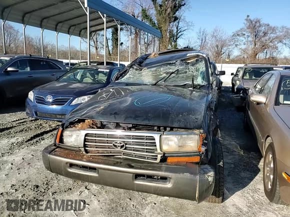 ✅ 1997 Toyota Land Cruiser • VIN: JT3HJ85J1V0161744 • Lot: 86346574. Listed on Copart with 104,904 mi. Free auction sales archive from the USA and detailed vehicle history report at DreamBid. Image 11.