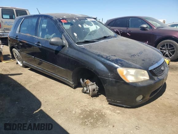 ✅ 2005 Kia Spectra • VIN: KNAFE162355127813 • Lot: 70565375. Listed on Copart with 228,164 mi. Free auction sales archive from the USA and detailed vehicle history report at DreamBid. Image 4.