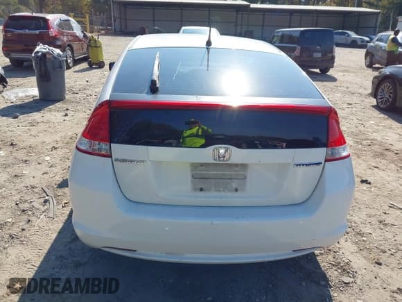 ✅ 2011 Honda Insight EX • VIN: JHMZE2H74BS004399 • Лот: 43653634. Опубликован ранее на IAAI с пробегом Не указан. Бесплатный доступ к архиву аукционных продаж из США и подробный отчёт об истории автомобиля на DreamBid. Изображение 16.