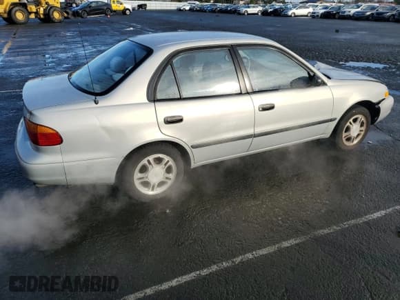 ✅ 2002 Chevrolet Prizm • VIN: 1Y1SK52842Z404089 • Lot: 49103545. Listed on Copart with 134,794 mi. Free auction sales archive from the USA and detailed vehicle history report at DreamBid. Image 3.