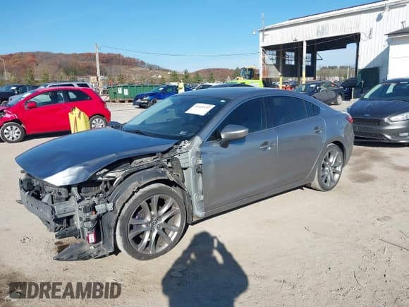 ✅ 2015 Mazda 6 i Grand Touring • VIN: JM1GJ1W56F1213509 • Lot: 43609197. Listed on IAAI with 96,094 mi. Free auction sales archive from the USA and detailed vehicle history report at DreamBid. Image 2.