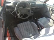 ✅ 1985 Volkswagen Cabriolet GTI • VIN: 1VWDB0174FV028495 • Lot: 81233604. Listed on Copart with 76,467 mi. Free auction sales archive from the USA and detailed vehicle history report at DreamBid. Image 8.