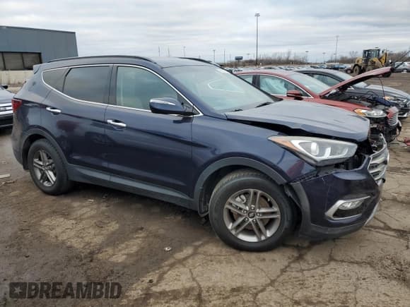 ✅ 2017 Hyundai Santa Fe 2.4L • VIN: 5XYZU3LB4HG448855 • Лот: 79426203. Опубликован ранее на Copart с пробегом 98 988 миль. Бесплатный доступ к архиву аукционных продаж из США и подробный отчёт об истории автомобиля на DreamBid. Изображение 4.