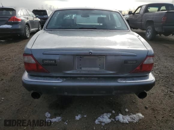 ✅ 2002 Jaguar XJ • VIN: SAJFA12C72LF47096 • Лот: 79412794. Опубликован ранее на Copart с пробегом 287 060 миль. Бесплатный доступ к архиву аукционных продаж из США и подробный отчёт об истории автомобиля на DreamBid. Изображение 6.