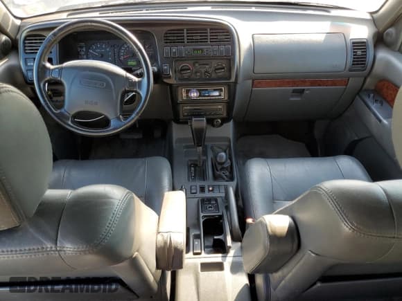 ✅ 1998 Isuzu Trooper S • VIN: JACDJ58X4W7915462 • Lot: 45632975. Listed on Copart with 135,215 mi. Free auction sales archive from the USA and detailed vehicle history report at DreamBid. Image 8.