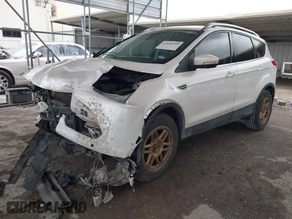 ✅ 2015 Ford Escape Titanium • VIN: 1FMCU0J91FUA27610 • Lot: 42095995. Listed on IAAI with 122,521 mi. Free auction sales archive from the USA and detailed vehicle history report at DreamBid. Image 18.