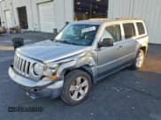 ✅ 2014 Jeep Patriot Latitude • VIN: 1C4NJPFB5ED905774 • Лот: 94293815. Опубликован ранее на Copart с пробегом 117 017 миль. Бесплатный доступ к архиву аукционных продаж из США и подробный отчёт об истории автомобиля на DreamBid. Изображение 1.