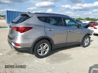 ✅ 2018 Hyundai Santa Fe 2.4L • VIN: 5XYZU3LB2JG511912 • Лот: 44390174. Опубликован ранее на Copart с пробегом 74 835 миль. Бесплатный доступ к архиву аукционных продаж из США и подробный отчёт об истории автомобиля на DreamBid. Изображение 3.