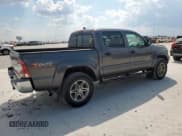 ✅ 2014 Toyota Tacoma PreRunner • VIN: 5TFJU4GN5EX054622 • Лот: 81393055. Опубликован ранее на Copart с пробегом 76 703 миль. Бесплатный доступ к архиву аукционных продаж из США и подробный отчёт об истории автомобиля на DreamBid. Изображение 3.