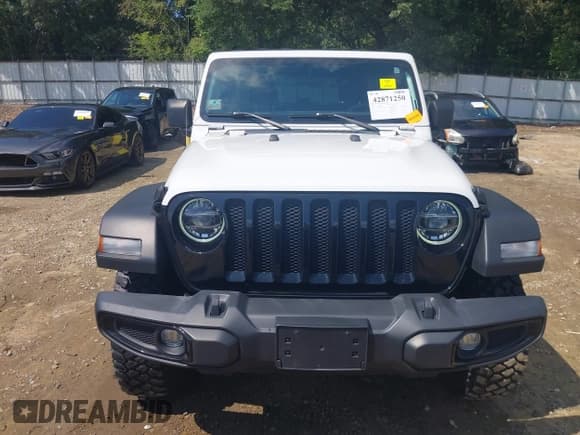 ✅ 2022 Jeep Wrangler Unlimited Sport S • VIN: 1C4HJXDG4NW112918 • Лот: 42871250. Опубликован ранее на IAAI с пробегом 63 564 миль. Бесплатный доступ к архиву аукционных продаж из США и подробный отчёт об истории автомобиля на DreamBid. Изображение 13.