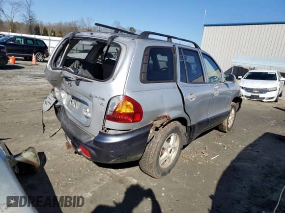 2004 Hyundai Santa Fe GLS с VIN KM8SC13D24U689800, выставлен на аукционе Copart как лот 88467245 с пробегом Не указан миль и Списание • Salvage title. История ставок и продаж доступна на DreamBid. Изображение 3.